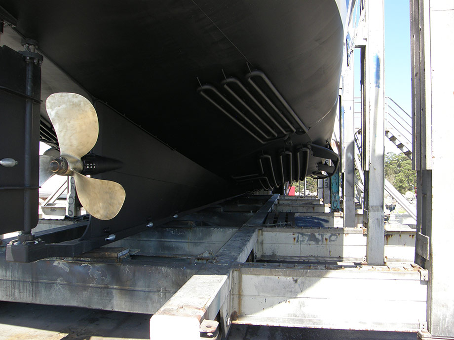 Commercial fishing vessel, showing airless painted bottom with prop blasted ready for Propspeed. 